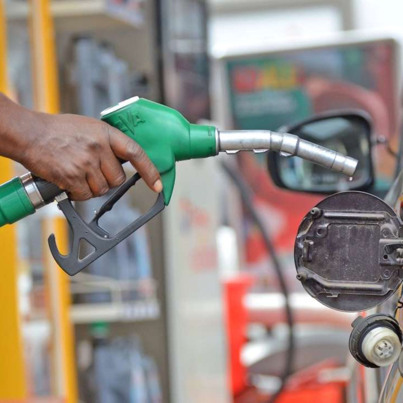 A petrol station worker fuels a car along Kimathi street on July 14 2019,after the Energy and Petroleum Regulatory Authority (EPRA) announced new retail pump prices of petroleum products effective from July 15 to August 14, 2019.price of super petrol increase by Sh0.29 per litre while diesel and kerosene decreased by Sh0.88 and SH2.31 per litre respectively.PHOTO|SILA KIPLAGAT